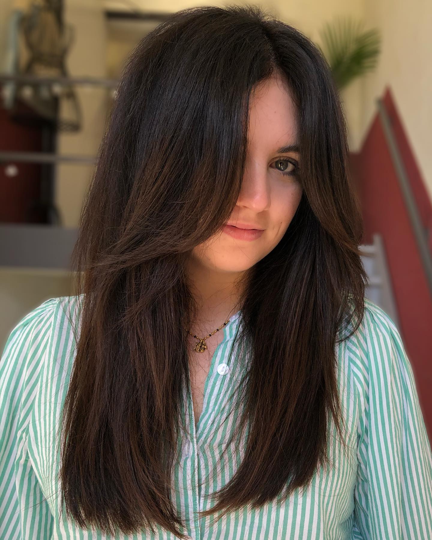 Long Textured Brunette Hair with Thick Bangs