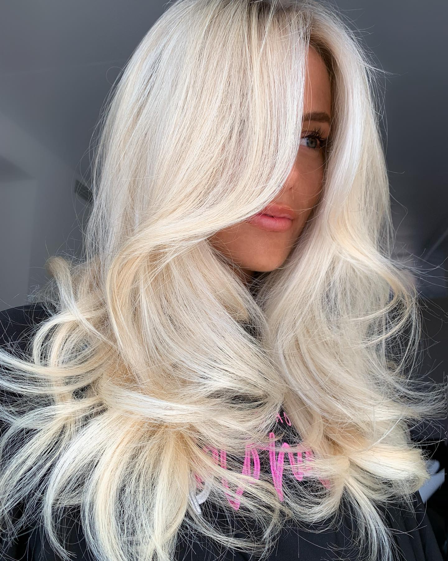 Bright White Blonde Layered Hairstyle