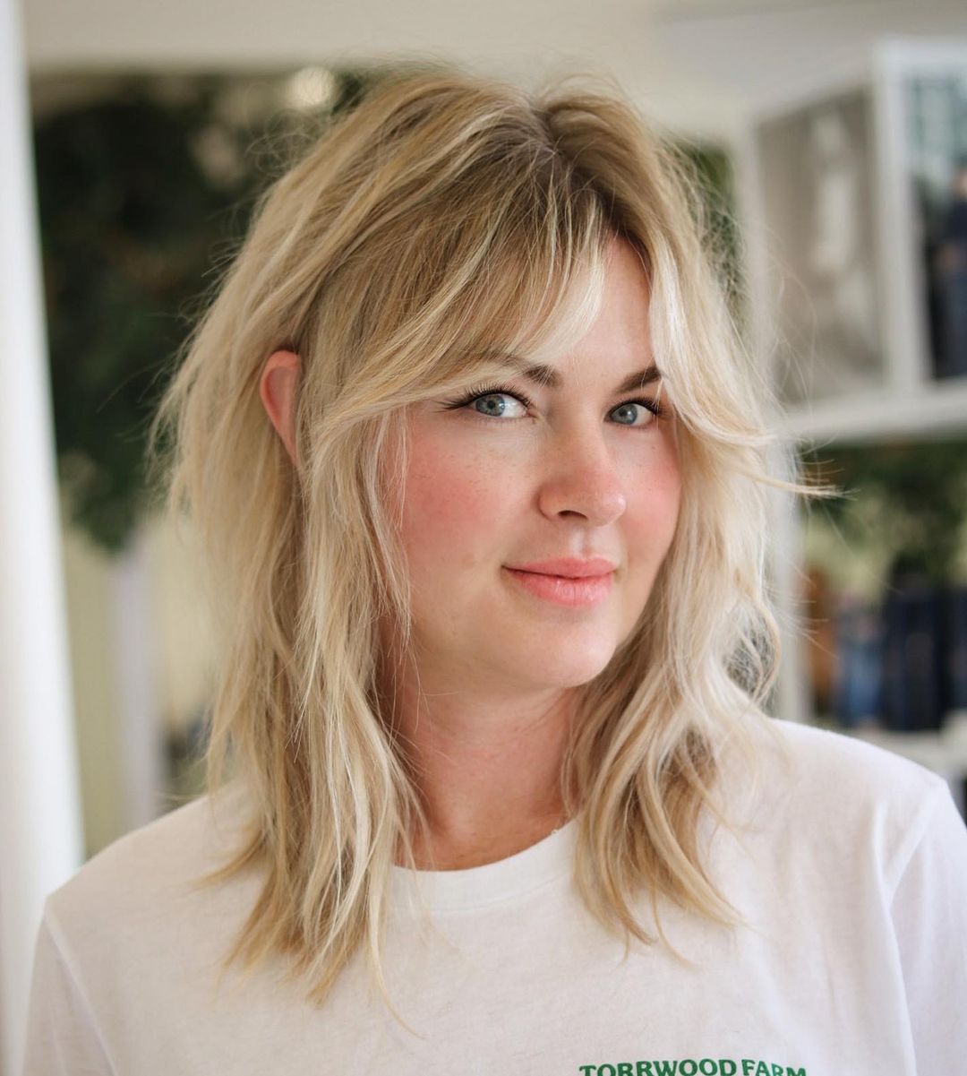 Cute Blonde Shag with Curtain Bangs