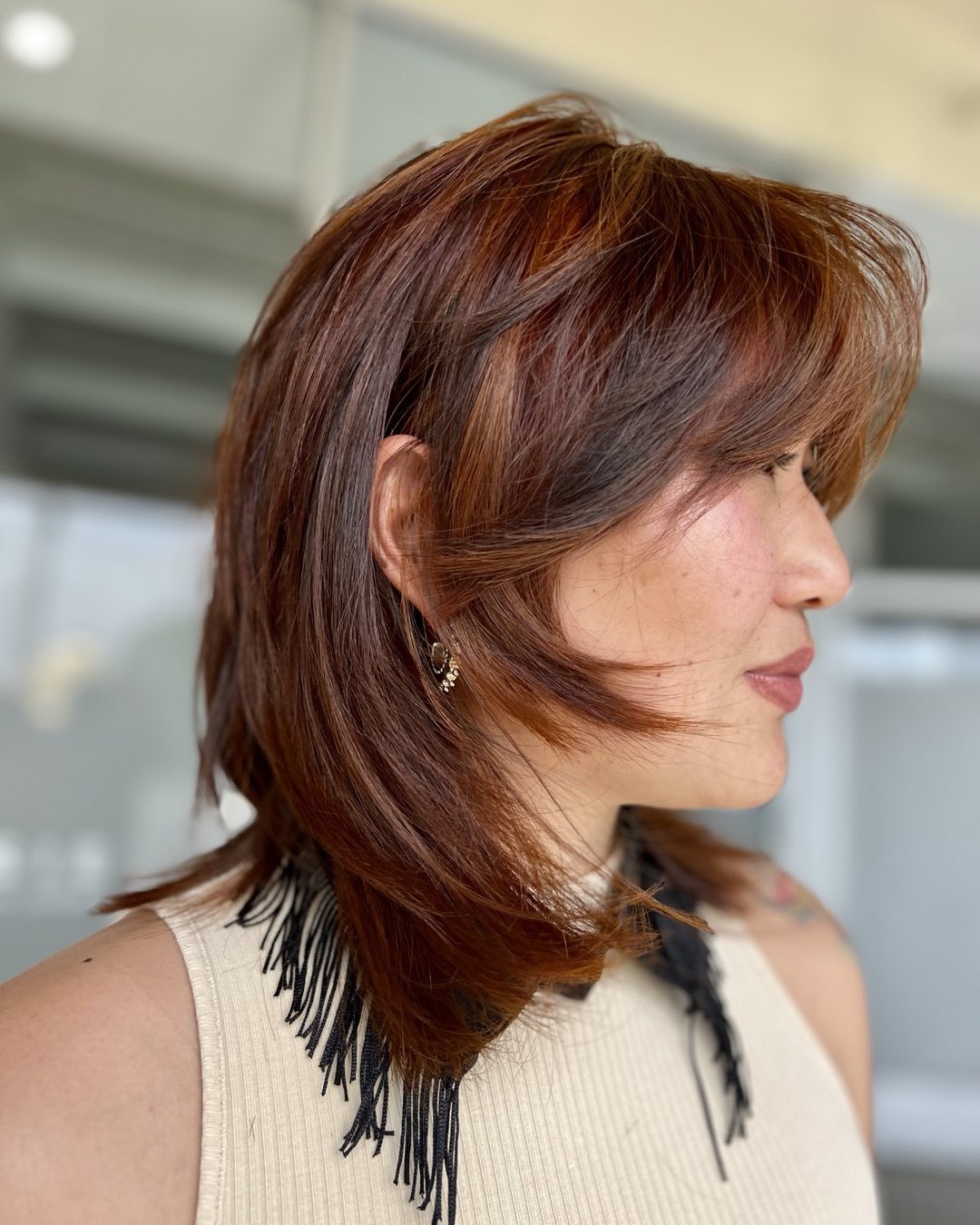 Collarbone Shag with Jaw-Length Layers and Bangs