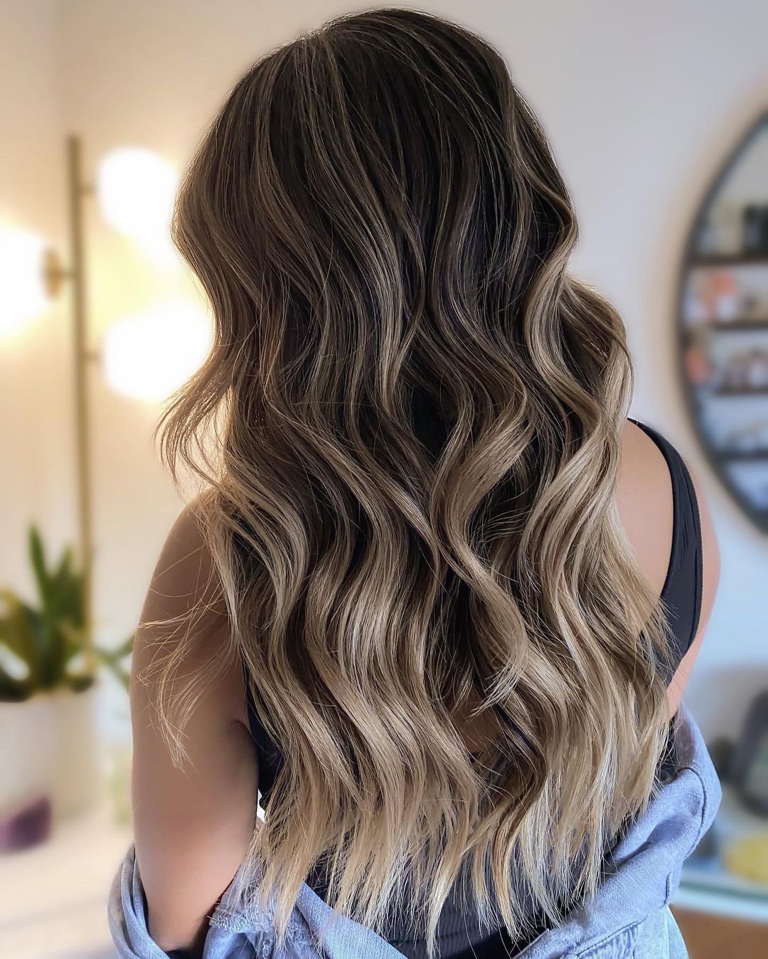 Long Dark Waves with Dirty Blonde Highlights